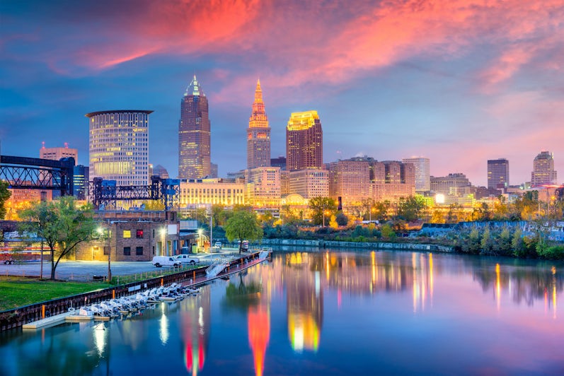 Cleveland, Ohio, USA skyline on the Cuyahoga River at sunset