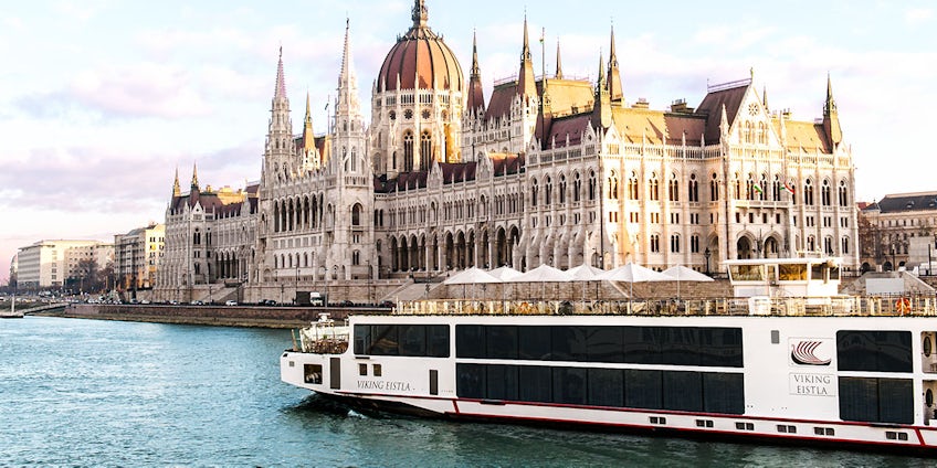 A Viking Longship sails past the parliament building in Budapest Hungary (Image: Viking)