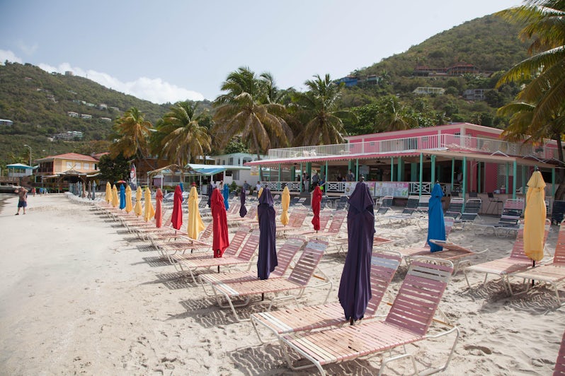 Loungers lining a beach in Tortola. (Photo: Cruise Critic)