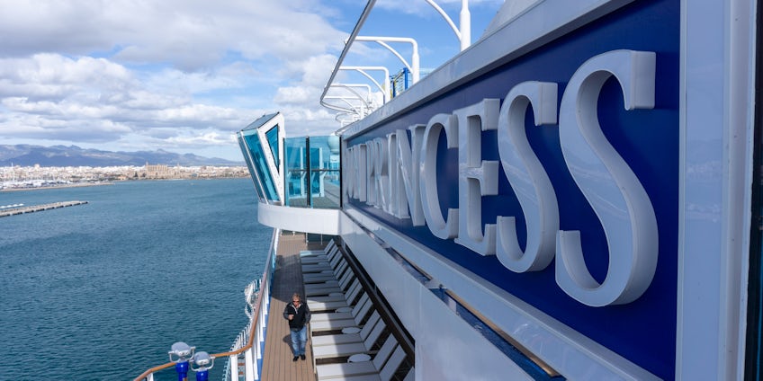 Looking aft aboard Sun Princess, next to the ship's upper-deck name (Photo: Aaron Saunders)
