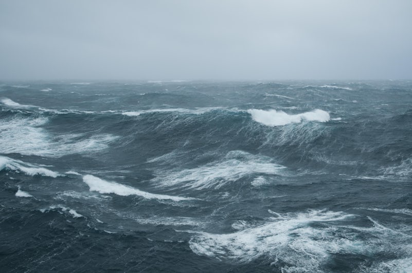 Dark and stormy seas, with white-capped waves
