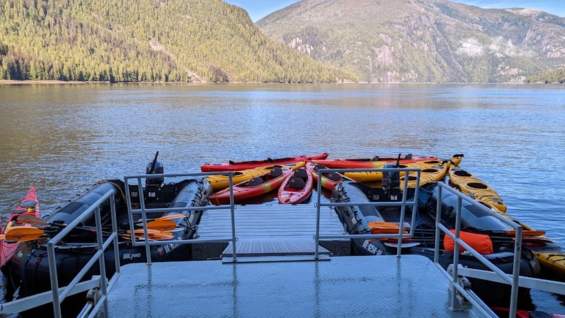 Kayaks are tied up behind the Ocean Victory marina in Alaska. (Photo: Colleen McDaniel)