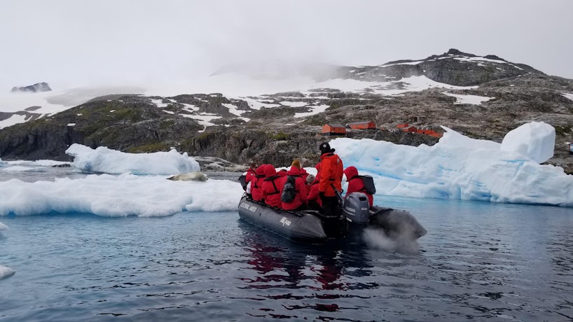 Group on a Zodiac excursion in Antarctica, approaching land