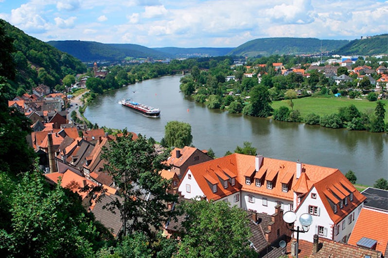 Riverboat cruising down the Main River in Miltenberg, Germany