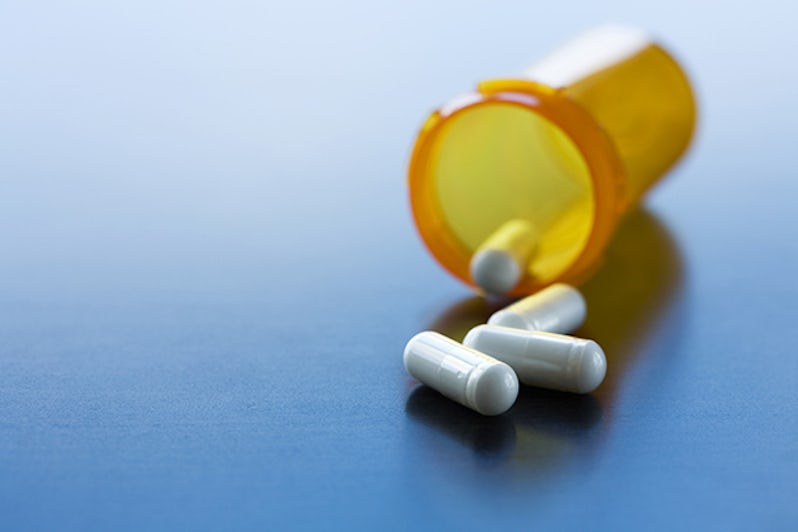 Capsules spilled from pill bottle