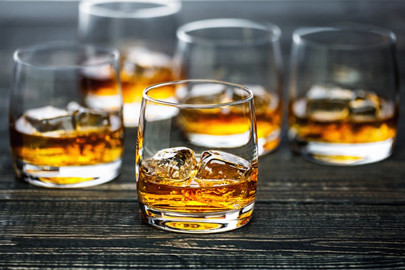 Glasses of bourbon on ice