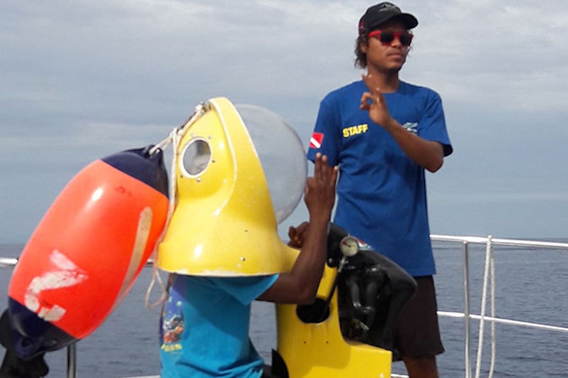 Dive leader instructing passengers on B.O.S.S. equipment