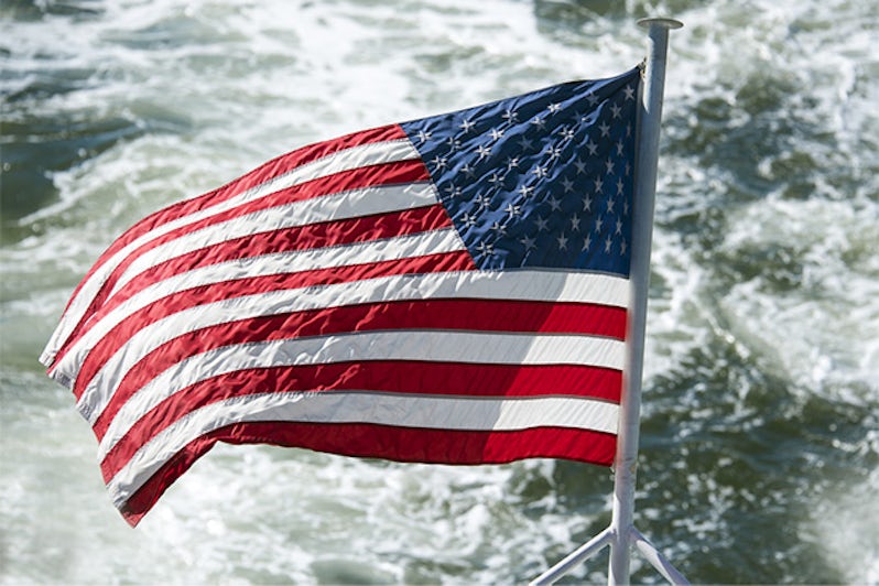 United States of America flag waving from a boat or cruise ship in the Hudson River