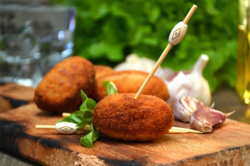 plate full of home-made croquettes of ham, typical Spanish dish