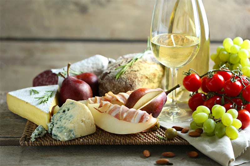 Still life with various types of Italian food and wine