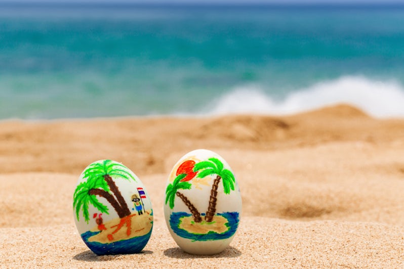 Easter vacation cruises - Easter eggs, painted with palms on the ocean beach