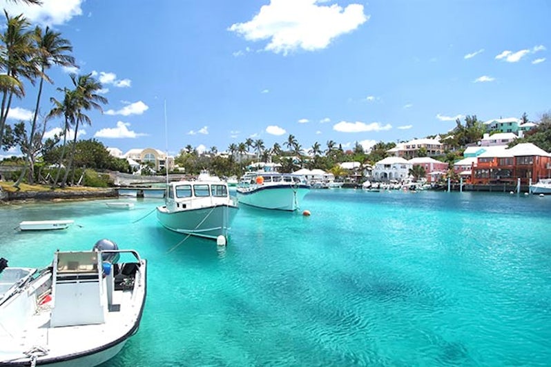 Yacht boats on blue sea water in tropical lagoon in Hamilton, Bermuda.