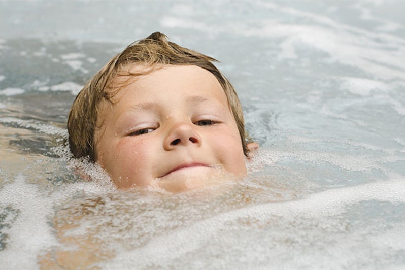 Kid in hot tub