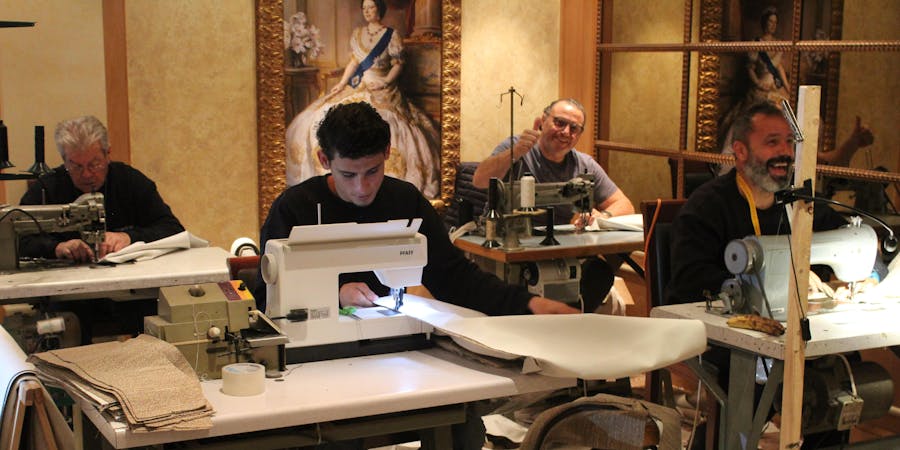 Craftsmen sewing in the Queens Room ballroom on Queen Elizabeth (Photo: Sarah Holt) Craftsmen sewing in the Queens Room ballroom on Queen Elizabeth (Photo: Sarah Holt)