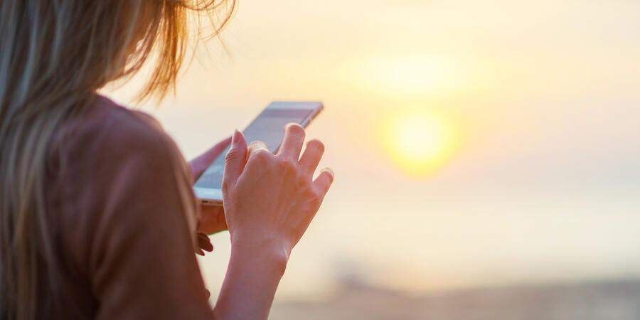 Woman using her phone (Photo: tolotola/Shutterstock) Woman using her phone (Photo: tolotola/Shutterstock)