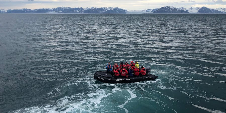Tauck Travel passengers, traveling on Ponant’s Le Boreal, set off on a Zodiac glacier excursion (Photo: Chris Gray Faust) Tauck Travel passengers, traveling on Ponant’s Le Boreal, set off on a Zodiac glacier excursion (Photo: Chris Gray Faust)