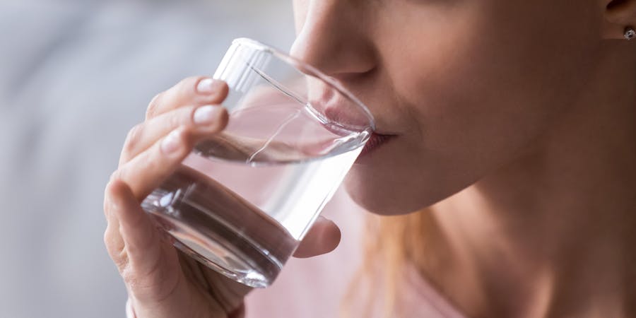 Woman Drinking Water (Photo: fizkes/Shutterstock) Woman Drinking Water (Photo: fizkes/Shutterstock)
