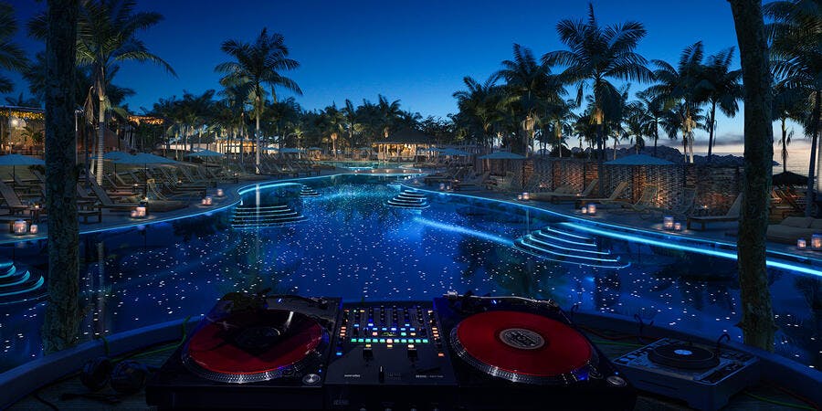 Poolside DJ booth at Virgin Voyages' Beach Club at Bimini (Image: Virgin Voyages) Poolside DJ booth at Virgin Voyages' Beach Club at Bimini (Image: Virgin Voyages)