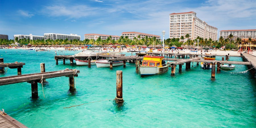 Dock on Palm Beach, Aruba on a Sunny Spring Afternoon (Photo: Jo Ann Snover/Shutterstock) Dock on Palm Beach, Aruba on a Sunny Spring Afternoon (Photo: Jo Ann Snover/Shutterstock)