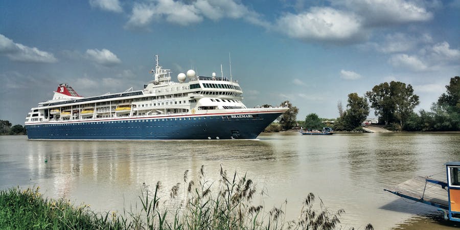 Fred. Olsen's Braemar cruising through Coria del Río near Seville, Spain (Photo: Fred. Olsen Cruise Lines) Fred. Olsen's Braemar cruising through Coria del Río near Seville, Spain (Photo: Fred. Olsen Cruise Lines)