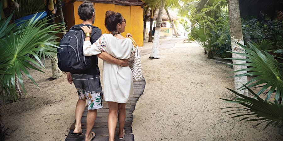 Couple heading to Bungalow on Princess Cays (Photo: Princess Cruises) Couple heading to Bungalow on Princess Cays (Photo: Princess Cruises)