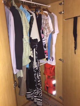 8350 - Closet with our clothes. Storage shelves to left of opening