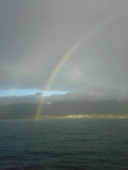 Rainbow over Maui from ship cabin balcony