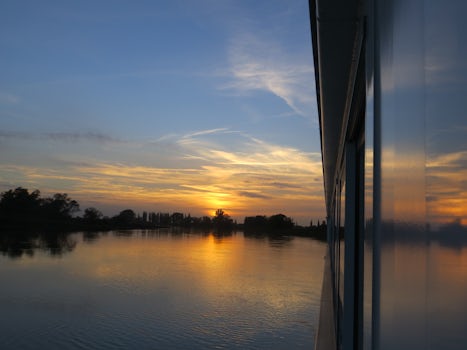 Sunset on the Elbe reflected in our cabin window.