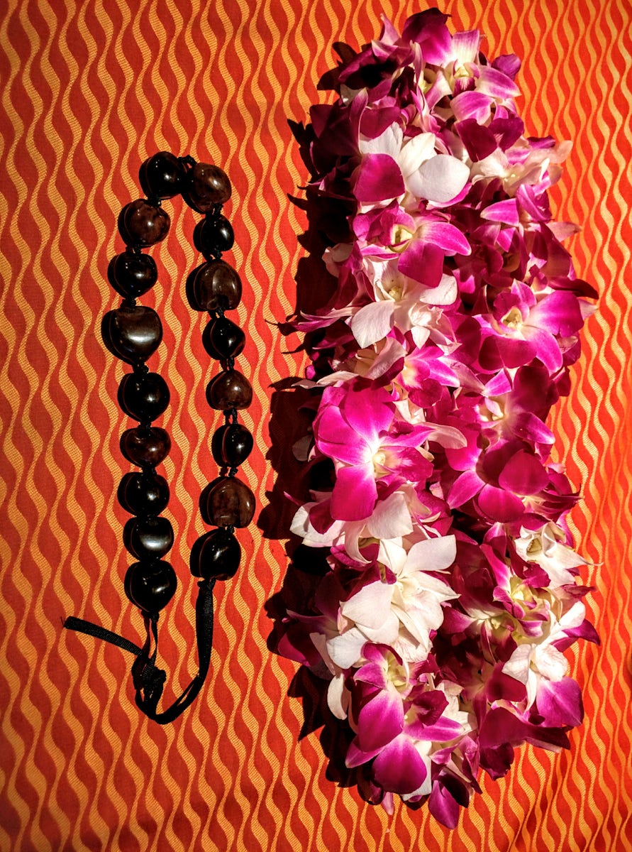 Orchid and kukui nut leis