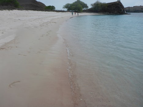 Pink Beach the sand has a slight pink colour from the red coral