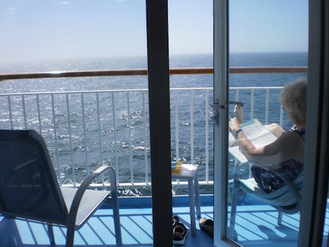 enjoying peace and quiet on a sea day on NCL Sun.  Balcony had good soundproofing