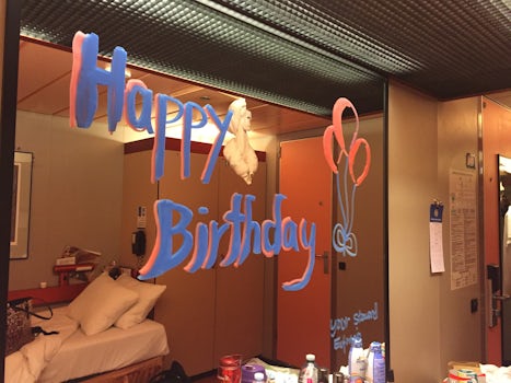 Birthday wishes from our cabin steward (towel monkey also hanging from ceiling)