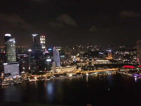 Singapore at night from the sky 57 restaurant at Marina Sands Bay