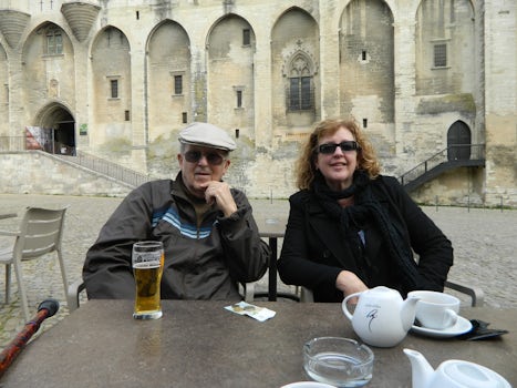 Bob Willett and Daughter sip in front of the Papal Palace in Avignon where Popes ruled for about 40 years, leaving Rome