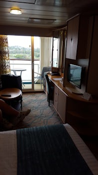Our balcony cabin #7048 on legend of the seas. Kettle cups tea sugar milk and fridge all provided in cabin. No coffee.