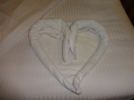 Towel heart left on our bed