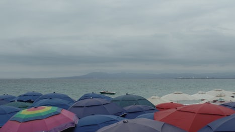 A sea of sun-umbrellas overlook Banderas Bay in Puerta Vallarta