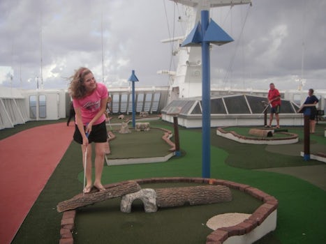 Playing mini golf on the roof.