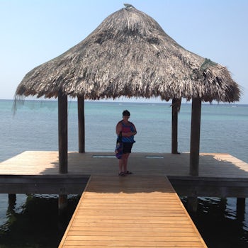 Standing on the dock at Spa Baan Suerte in Roatan after my facial, body scrub
