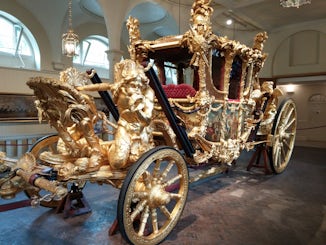 The Queens Royal Carriage, used for her 90th Birthday, and seen up close on the tour of the Royal Mews in London, Home to the horses, carriages, cars used by the queen.