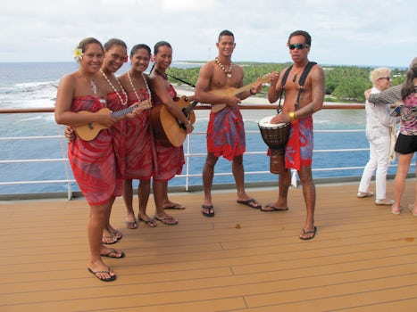 Polynesian group which stayed onboard the whole trip and performed for us. Very worthy and great for pictures. Excellent stage performance!.