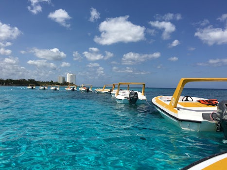 2-Person Speed Boats take you to Snorkeling in Cozumel