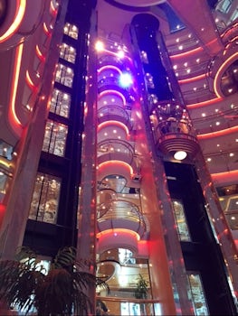 The elevators run up and down overlooking The Centrum at the mid section