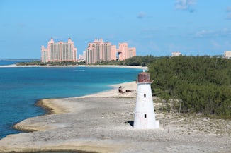 Lighthouse on Paradise Island, Atlantis resort in the background.