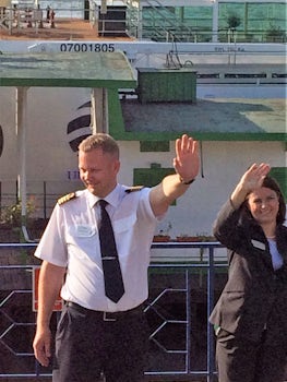 waving goodbye to captain and hotel manager