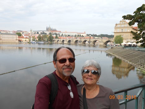 My wife and I in Prague, with the old Charles Bridge in the background.