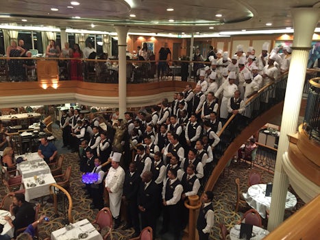 Dining staff, main dining room, farewell song on the last night.