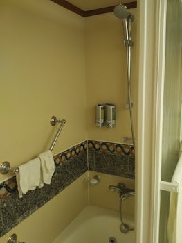 Jetted tub, shower enclosure