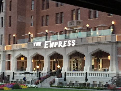 FRONT OF EMPRESS HOTEL FROM BUS AS WE TRAVELED TO BUTCHART GARDENS AT DUSK