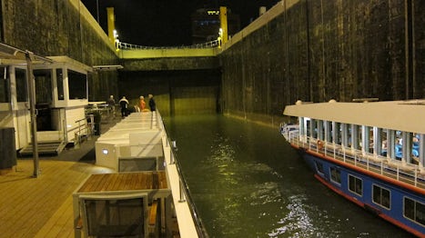 Waiting alongside another river cruiser to exit a large lock on the Danube.